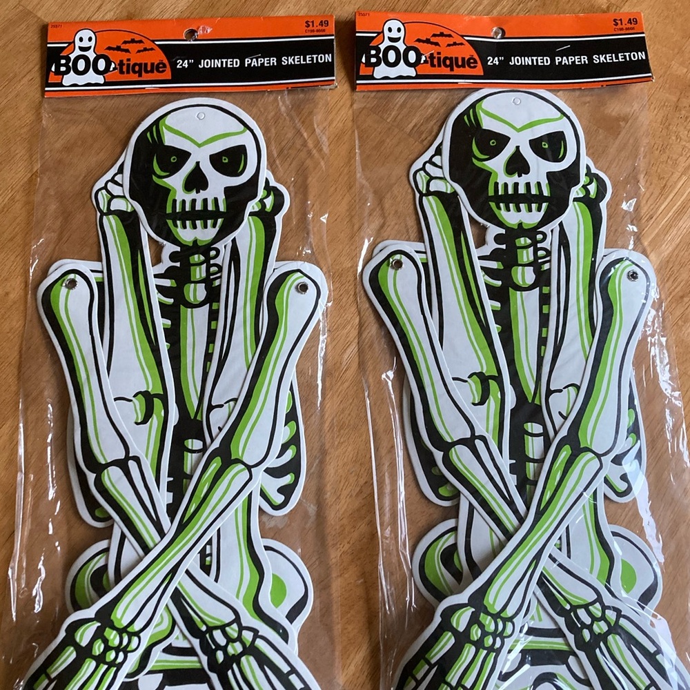 Two hinged Halloween skeleton die cuts